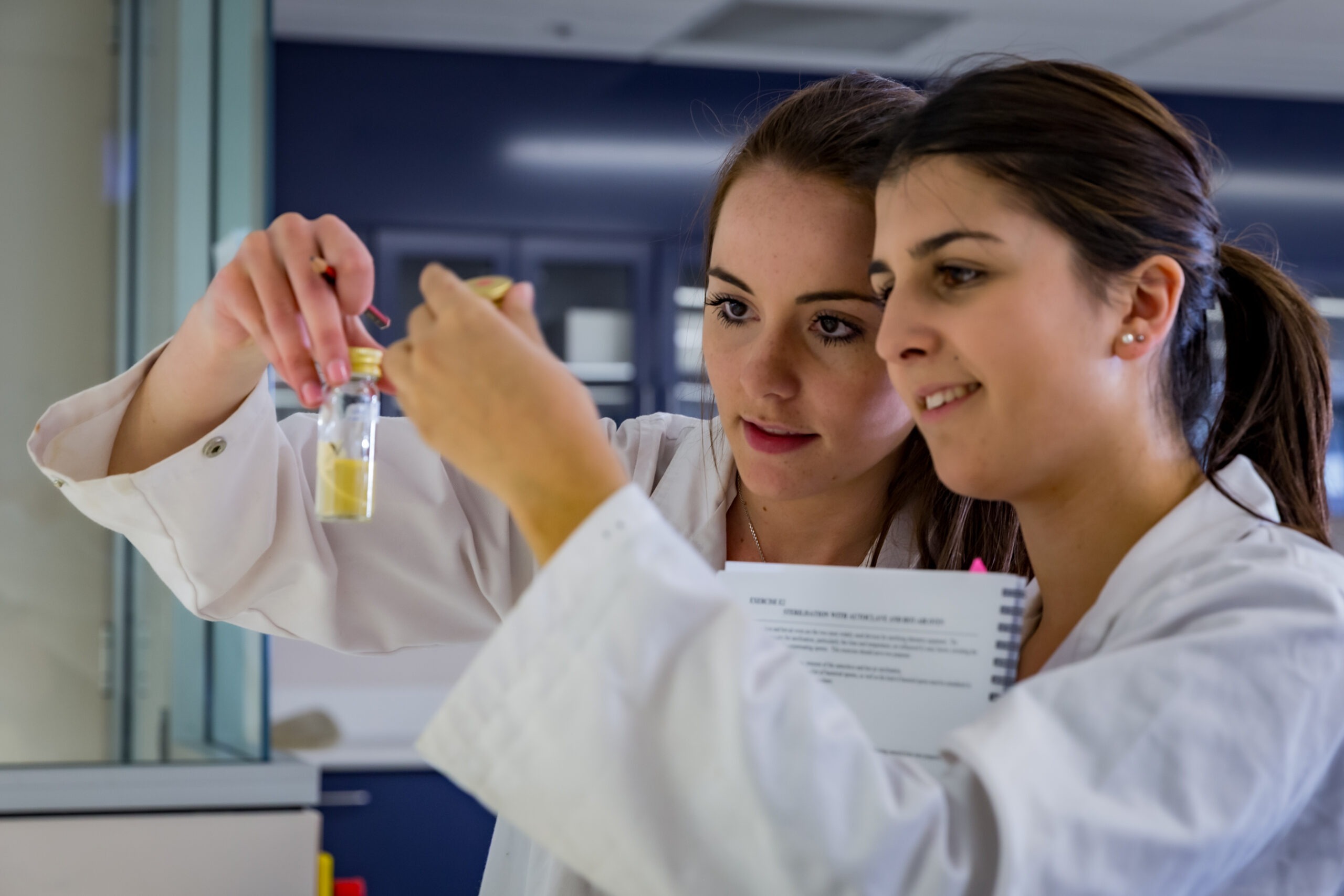 Editorial Photography - two students in a lab. 